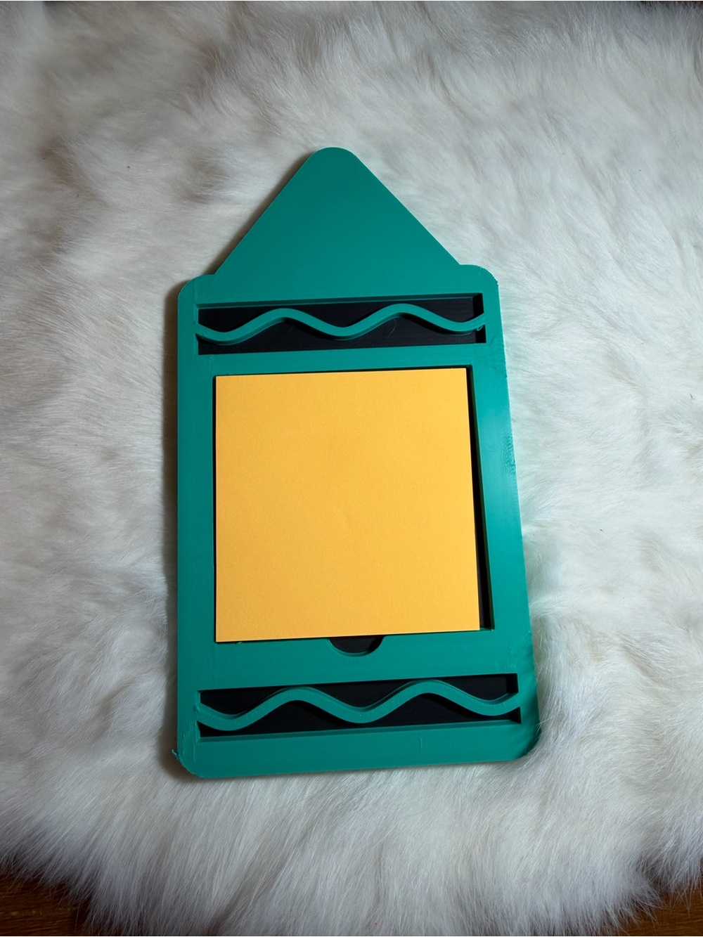 Teal Note Holder with Yellow Sticky Notes